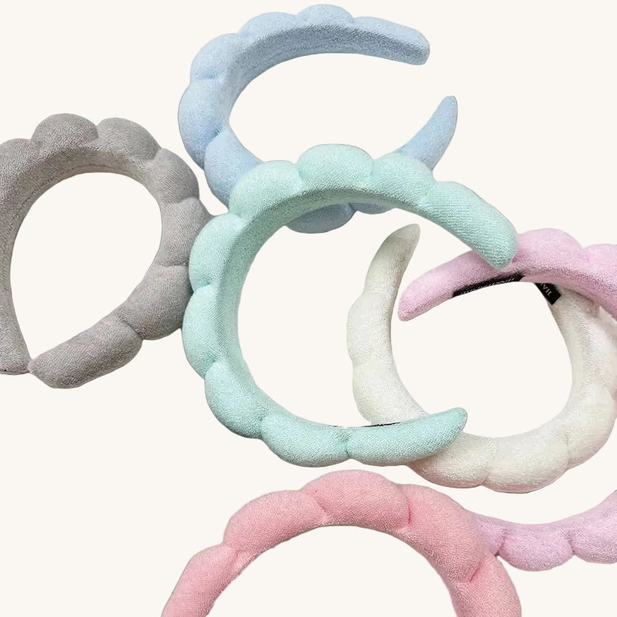 Set of colorful headbands on a white background
