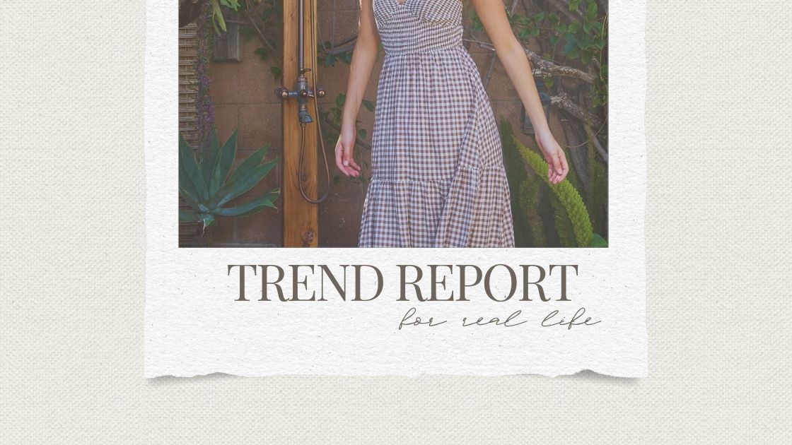 Woman wearing brown gingham smocked bodice maxi dress with gold hoop earrings and anklet — summer 2026 trend report from Wavy Boutique