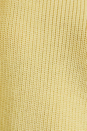 Close-up of a textured yellow fabric surface