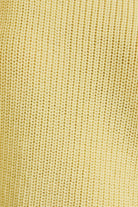 Close-up of a textured yellow fabric surface